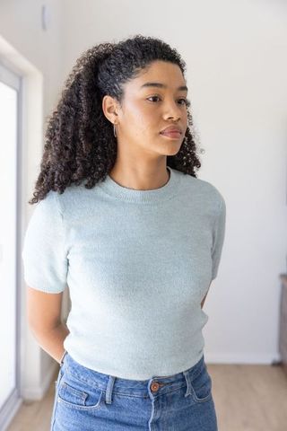 Confident African American Woman in Sunlit Home