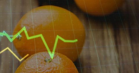 Oranges sitting on wooden table with neon analytics overlaying grid conveying citrus market