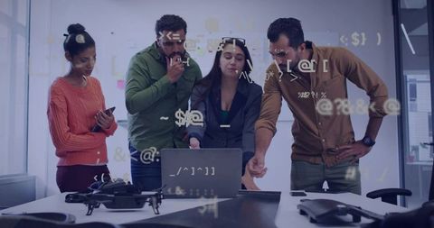 Team collaborating over laptop with drone and code overlay for tech strategy