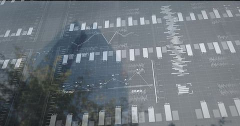 Glass skyscraper reflecting financial data with overlaid bar and line graphs for analytics