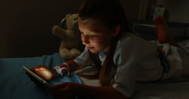 Young Girl in Hospital Bed Using Smartphone at Night - Download Free Stock Images Pikwizard.com