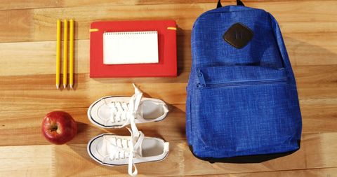 Back-to-School Supplies Neatly Arranged on Wooden Surface - Download Free Stock Images Pikwizard.com
