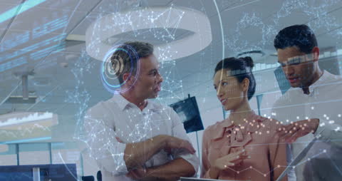 Diverse Business Team Discusses Data Visualization and Technology