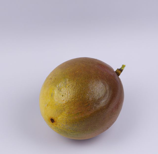 Close up of fresh and ripe passion fruit on white background. Nature, fruit and food concept.