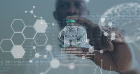 Scientist Analyzing COVID-19 Vaccine with Futuristic Medical Data Overlay - Download Free Stock Images Pikwizard.com