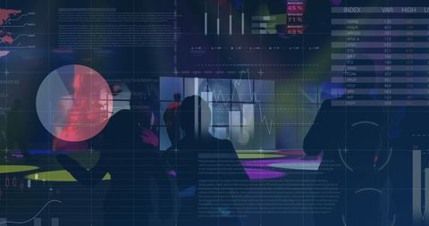 Silhouetted Figures in Front of Dynamic Financial Data Display - Download Free Stock Images Pikwizard.com
