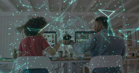 Developers collaborating with futuristic hologram interface