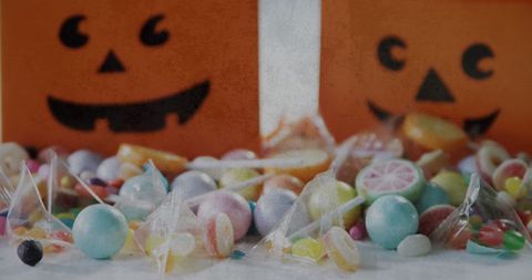 Spooky Halloween Candies and Pumpkin Bags with Grunge Effect - Download Free Stock Images Pikwizard.com