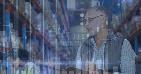 Warehouse Workers Analyzing Digital Financial Trends