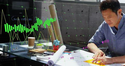 Asian businessman analyzing financial data with holographic display