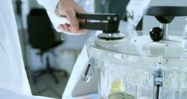 Scientific Researcher Adjusting High-Tech Laboratory Equipment - Download Free Stock Images Pikwizard.com