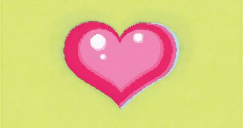 Pixel art heart with shading on green yellow background