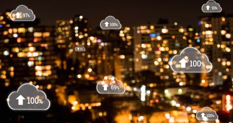 Digital Data Clouds Over Urban Nightscape Illustrating Connectivity