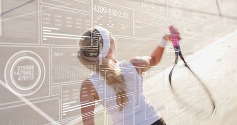 Tennis Player Analyzing Forehand Technique with Technology