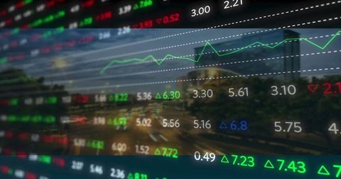 Digital Financial Graph Overlay on City Street at Night