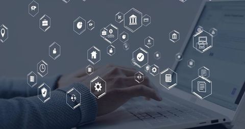 Typing Hands on Laptop with Floating Digital Hex Icons for Business Interface and Productivity