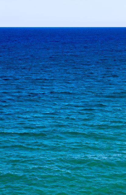 Clean Blue Rippled Sea and Clear Sky on a Sunny Day - Download Free Stock Photos Pikwizard.com