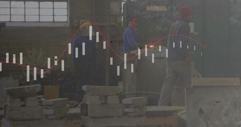 Industrial Workers Analyzing Financial Data Overlay in Manufacturing Setting