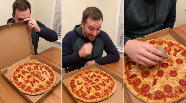 Man opening pizza proposal box spelling marry me with pepperoni, surprise ring reaction