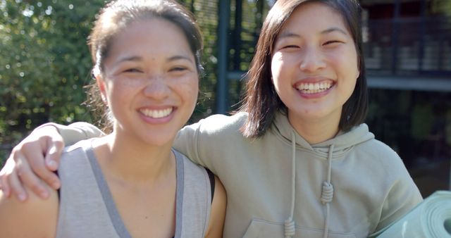 Smiling Friends Enjoying Time Outdoors Together - Download Free Stock Images Pikwizard.com