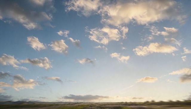 Soft Cumulus Clouds Filling Expansive Blue Sky Over Wide Open Grassland Horizon, Panoramic
