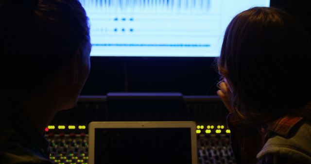 Sound Engineers Collaborating in Recording Studio - Download Free Stock Images Pikwizard.com