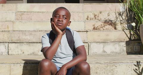 Pensive Boy Outdoors in Sunny Weather with Face Mask - Download Free Stock Images Pikwizard.com