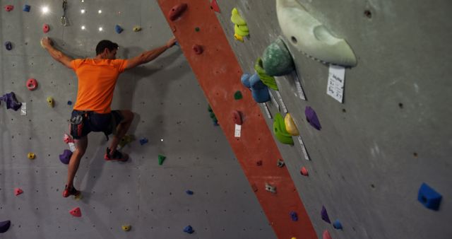 Man Climbing Indoor Bouldering Wall in Gym - Download Free Stock Images Pikwizard.com