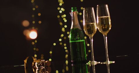Festive Champagne Celebration with Glasses and Confetti