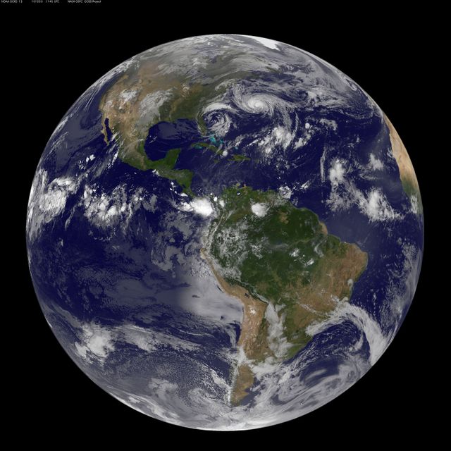 Image showing Western Hemisphere of Earth with Hurricane Joaquin swirling over Atlantic Ocean north of Bermuda. Taken on October 5, 2015 by GOES East satellite. Excellent for educational use about meteorology, Earth's geography, climate studies, natural disasters.