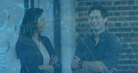 Colleagues Discussing Analytics with Digital Overlay