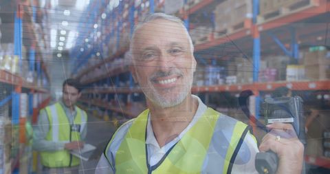 Warehouse Logistics Worker Smiling with Barcode Scanner