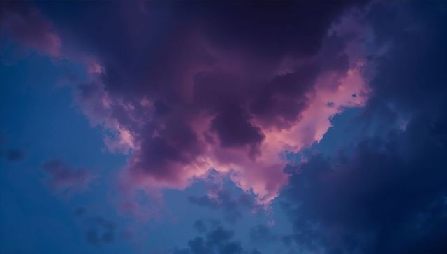 Vibrant Purple and Pink Cloudscape at Dusk