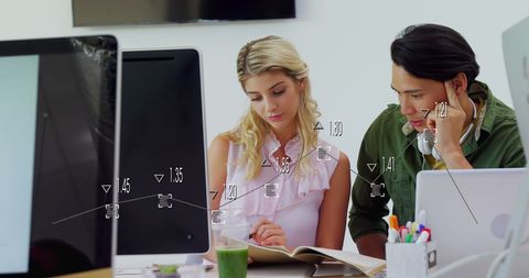 Business Team Analyzing Data and Planning with Digital Interface