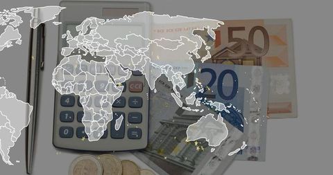Global finance flatlay showing calculator, euro banknotes, coins and world map overlay