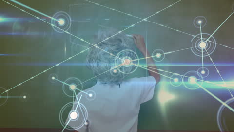 Child Writing on Chalkboard with Digital Data Animation Overlay