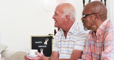 Senior Friends Celebrating Cancer Survivorship with Coffee