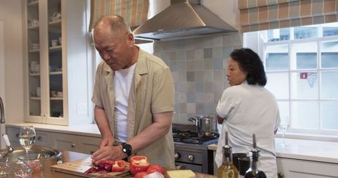 Senior Couple Cooking Together at Home