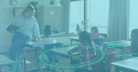 Female teacher leaning and engaging students with tablet and augmented HUD in classroom