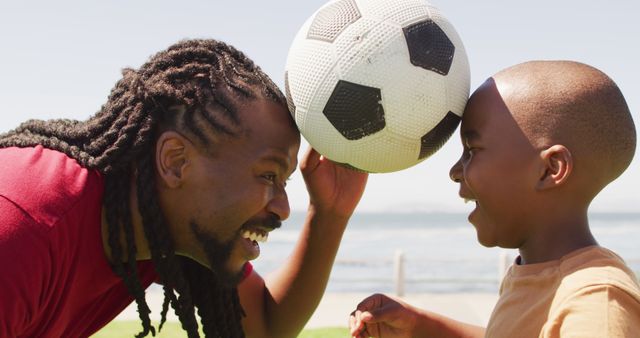 Father and Son Playing Soccer Outdoors - Download Free Stock Images Pikwizard.com