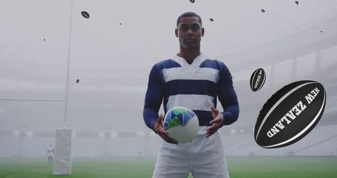 Rugby player holding ball in stadium amid floating new zealand designs