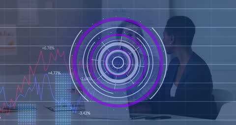 Businesswomen Discussing Data Analytics in Modern Office