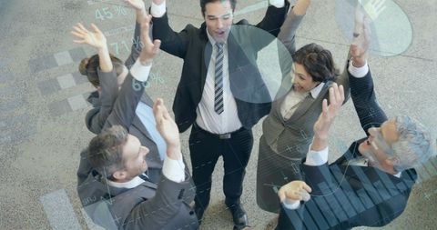 Successful Business Team Celebrating Growth Achievements