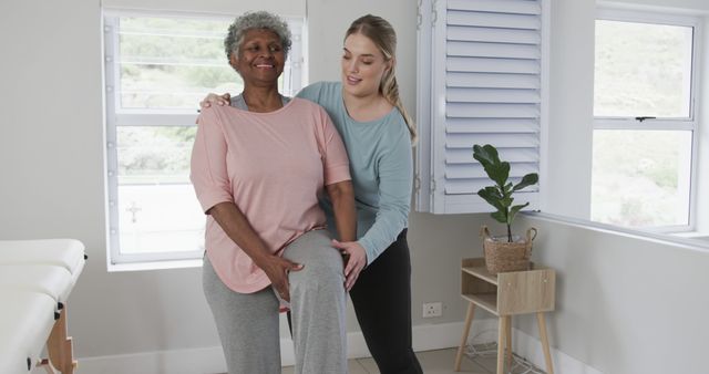 Senior Woman Receiving Physiotherapy from Young Female Therapist - Download Free Stock Images Pikwizard.com