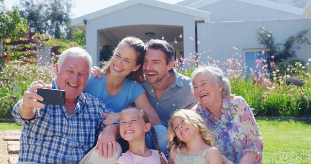 Happy Multigenerational Family Taking Selfie Outdoors in Garden - Download Free Stock Images Pikwizard.com