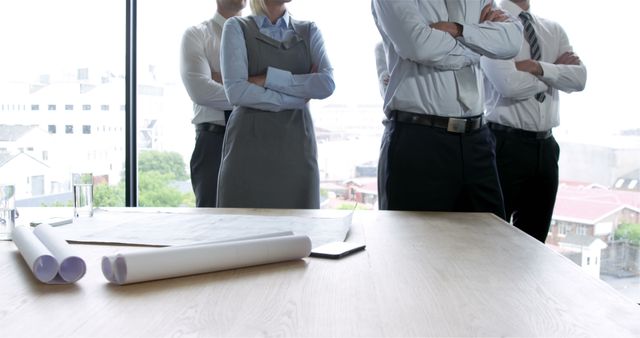 Group of Business Professionals Standing with Arms Crossed in Office - Download Free Stock Images Pikwizard.com