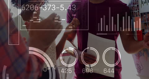 Diverse Business Team Analyzing Financial Data with Innovative Interface