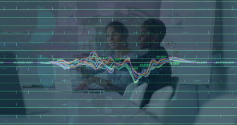 Diverse Business Team Analyzing Financial Statistics in Modern Office