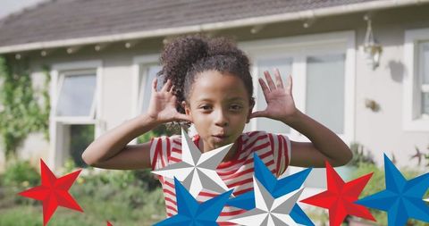 Playful Child Celebrating American Independence