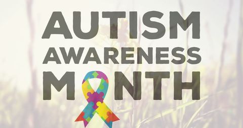 Autism awareness month ribbon over natural background